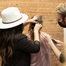 Stylists working with a model